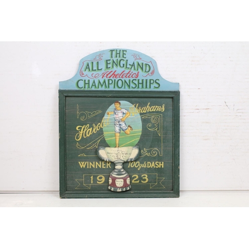 459 - The All England Athletics Championships wooden sign, depicting Harold Abrahams, Winner 100yds dash 1... 