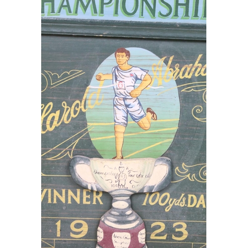 459 - The All England Athletics Championships wooden sign, depicting Harold Abrahams, Winner 100yds dash 1... 