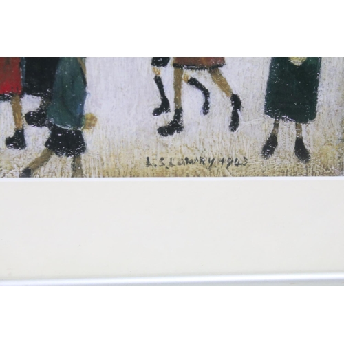 479 - After L S Lowry, a gallery framed print titled ' A Village Square ', label on verso, 45cm x 59.5cm, ... 