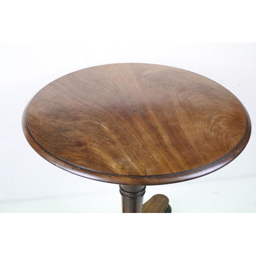 634 - Mid 19th century Mahogany Circular Supper Table raised on a turned pedestal supports and a shaped pl... 