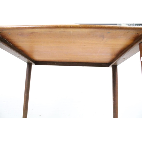 662 - Mid century Retro Nest of Three Teak Tables raised on turned legs, believed to be Danish for H W Kle... 