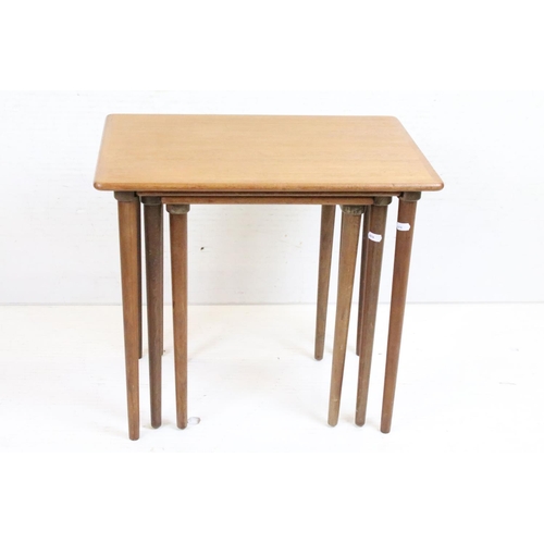 662 - Mid century Retro Nest of Three Teak Tables raised on turned legs, believed to be Danish for H W Kle... 