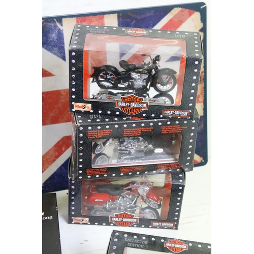 398 - A group of Harley Davidson Motorcycle collectables to include Maisto models, tin plate signs, money ... 