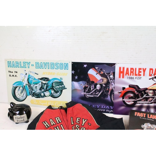 398 - A group of Harley Davidson Motorcycle collectables to include Maisto models, tin plate signs, money ... 