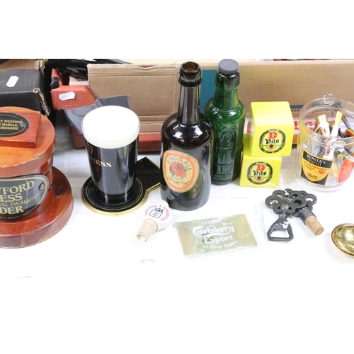 399 - A large collection of mixed Brewery collectables to include Beer pump handles, taps, advertising, ch... 