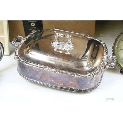 400 - A large collection of mixed silver plate to include tea sets, canteen of cutlery, candlesticks, crue... 