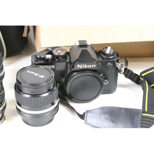 403 - A collection of mixed photography equipment to include camera's, lenses, video camera and various ac... 