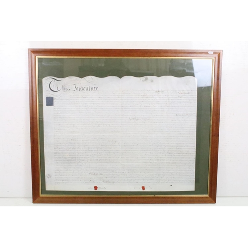 527 - Two 18th / 19th century Indentures, framed and glazed, the largest 83 x 101.5cm overall