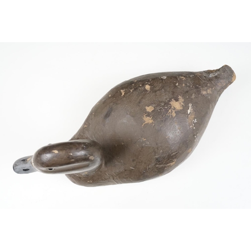 157 - Two early 20th Century carved and hand painted decoy ducks. Both unmarked, with flat bases. Measures... 