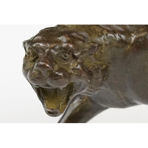 195 - A Chinese bronze figure in the form of a tiger.