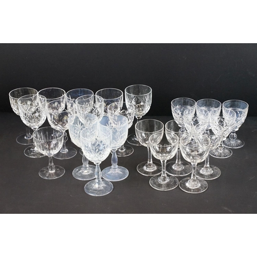 100 - Collection of cut glass glasses, many being signed. Makers to include Stuart and Edinburgh (mostly S... 