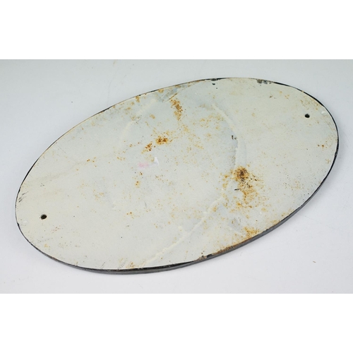 128 - Cast Iron Oval ‘ Antiques ‘ Sign, 34cm long