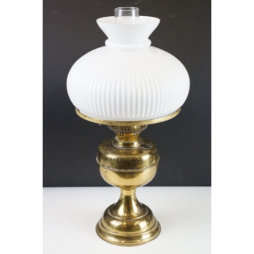 129 - 20th Century oil lamp with Austrian white glass shade, chimney, and a gilt metal reservoir & foot. M... 