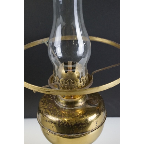 129 - 20th Century oil lamp with Austrian white glass shade, chimney, and a gilt metal reservoir & foot. M... 