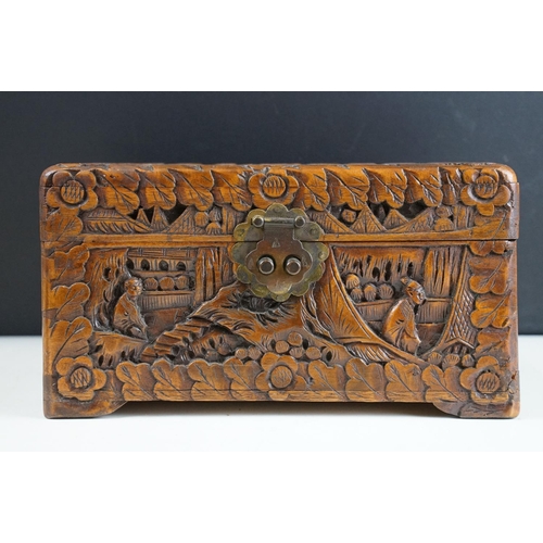 130 - 19th Century mahogany box of sarcophagus form, opening to a three compartment interior (25.5cm wide)... 