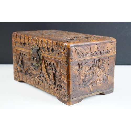 130 - 19th Century mahogany box of sarcophagus form, opening to a three compartment interior (25.5cm wide)... 