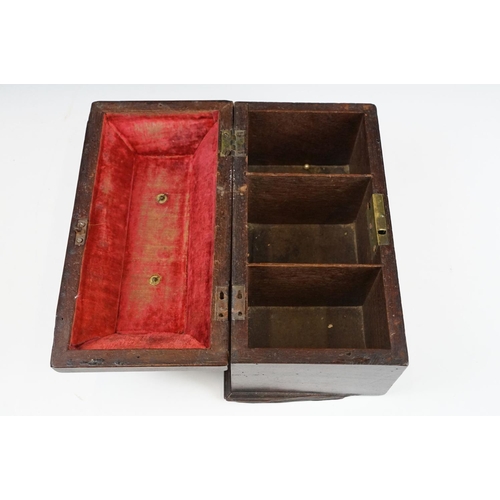 130 - 19th Century mahogany box of sarcophagus form, opening to a three compartment interior (25.5cm wide)... 