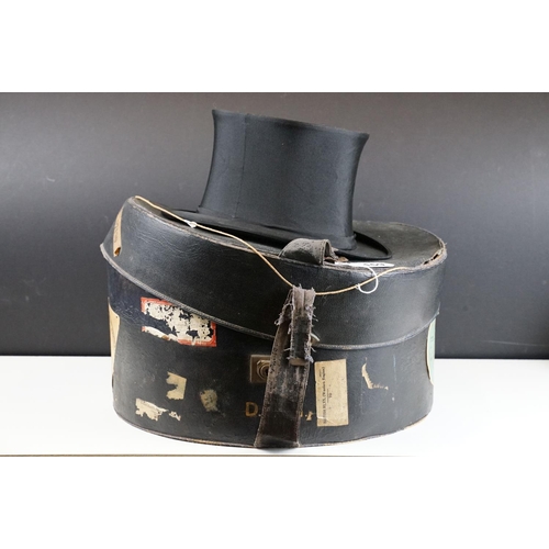 159 - Early 20th Century Henry Heath collapsible top hat together with a leather bound travel case with bl... 