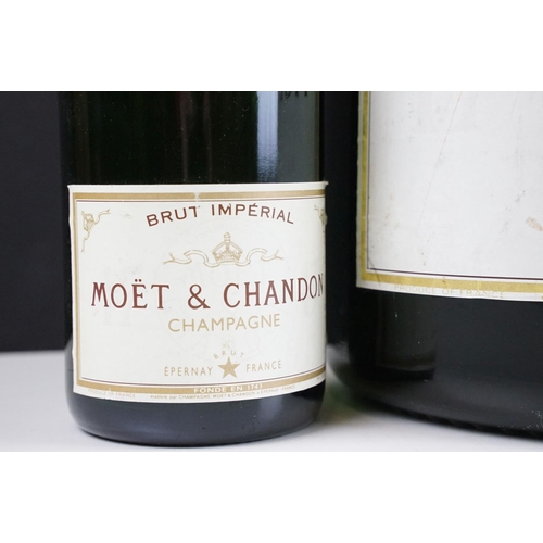 177 - Large Moet & Chandon champagne dummy bottle together with two smaller examples. Measures 68cm tall, ... 