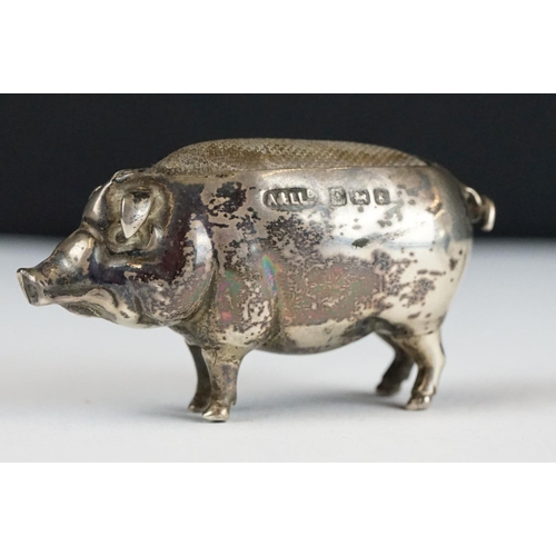 267 - An early 20th century fully hallmarked sterling silver pin cushion in the form of a pig, assay marke... 