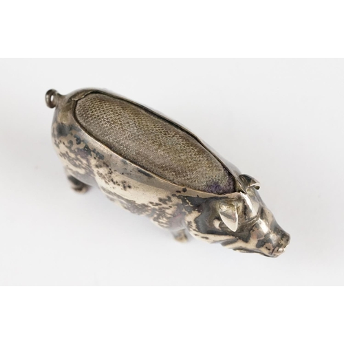 267 - An early 20th century fully hallmarked sterling silver pin cushion in the form of a pig, assay marke... 