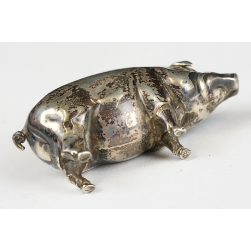 267 - An early 20th century fully hallmarked sterling silver pin cushion in the form of a pig, assay marke... 