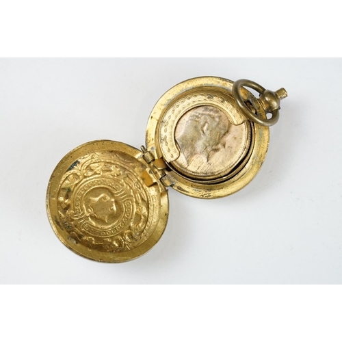 275 - A set of antique brass sovereign scales together with a sovereign holder.