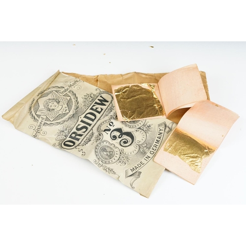 280 - A Quantity of gold leaf contained within paper envelopes.