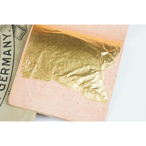 280 - A Quantity of gold leaf contained within paper envelopes.