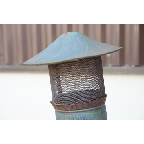 542 - Contemporary metal chimenea with grape & vine decoration (approx 175cm tall), together with a cast i... 