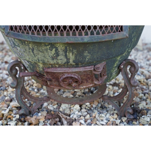 542 - Contemporary metal chimenea with grape & vine decoration (approx 175cm tall), together with a cast i... 