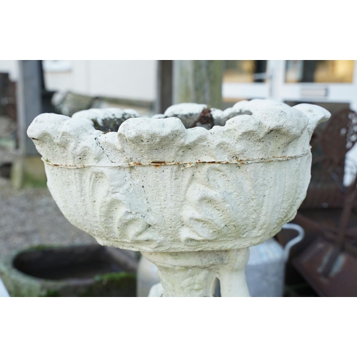 547 - Reconstituted stone garden planter of classical form, together with two reconstituted stone garden s... 