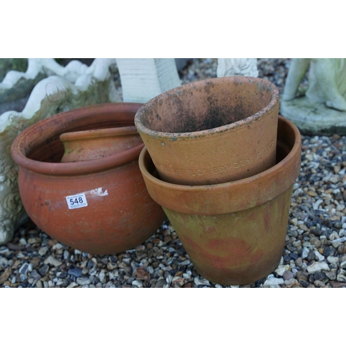 548 - Group of four terracotta garden planters together with a reconstituted stone example, plus two recon... 