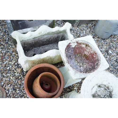 548 - Group of four terracotta garden planters together with a reconstituted stone example, plus two recon... 