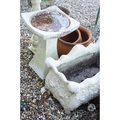 548 - Group of four terracotta garden planters together with a reconstituted stone example, plus two recon... 