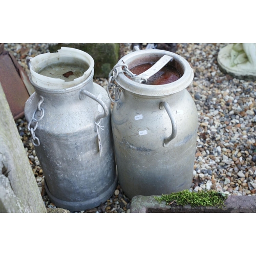 549 - Two aluminium milk churns, twin-handled, of typical form, approx 53cm high