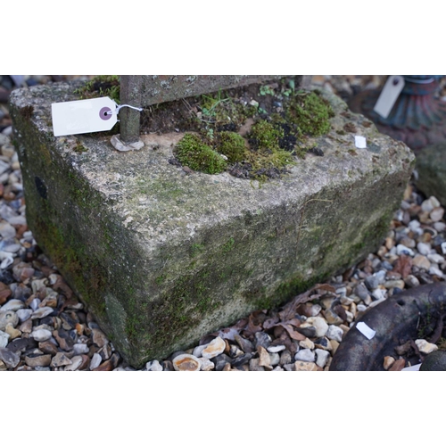 550 - Wrought iron boot scraper set into a stone base, base measures approx 45cm x 30cm