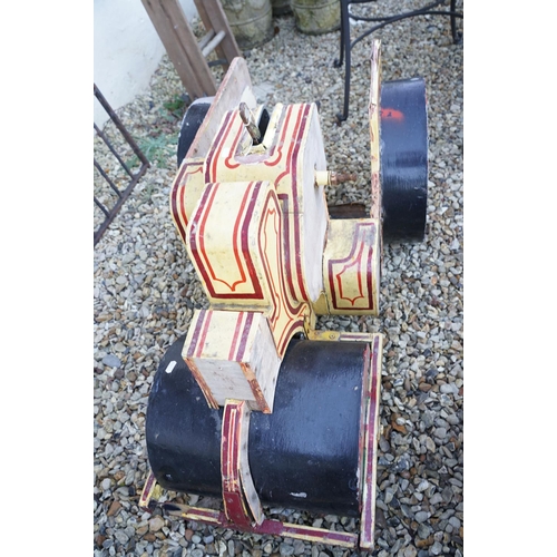 566 - Mid 20th C steam roller fairground ride with pin striped detail, approx 104cm long (a/f)