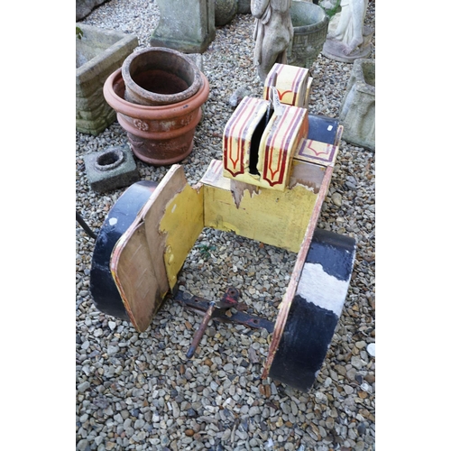 566 - Mid 20th C steam roller fairground ride with pin striped detail, approx 104cm long (a/f)