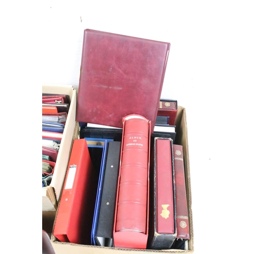 418 - Two boxes of empty stamp collectors albums including Stanley Gibbons examples.