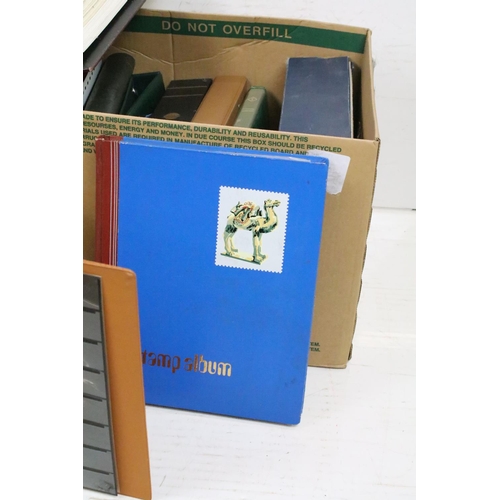 419 - Two boxes of empty stamp collectors albums, together with a collection of philatelic books and guide... 