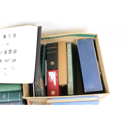 419 - Two boxes of empty stamp collectors albums, together with a collection of philatelic books and guide... 