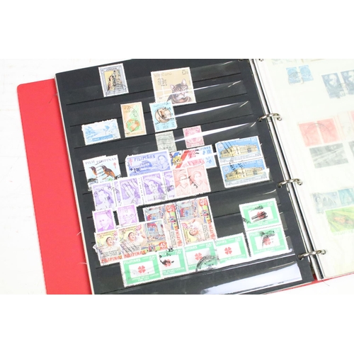 432 - Collection of world stamps including an album featuring Victorian and later GB stamps including penn... 