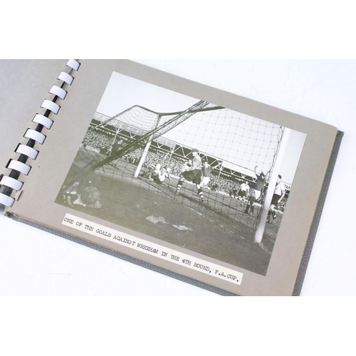 331 - A photograph album containing ten original black and white photographs of Manchester United Football... 