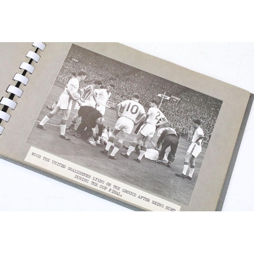 331 - A photograph album containing ten original black and white photographs of Manchester United Football... 