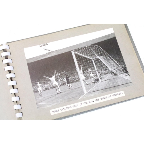 331 - A photograph album containing ten original black and white photographs of Manchester United Football... 