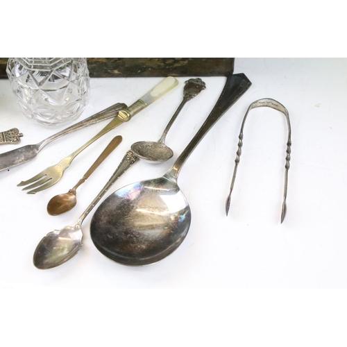 333 - A collection of mixed silver and silver plate to include cutlery, sugar shaker, bottle stopper, suga... 