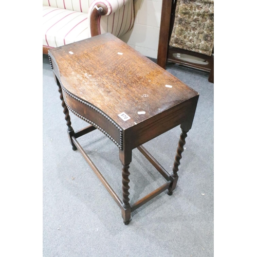 570 - 1930's / 40's Oak Canteen of Cutlery Table raised on barley-twist supports, the serpentine top with ... 