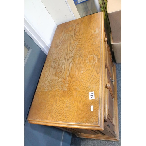 571 - German Oak Dresser Base or Side Cabinet with two drawers over two cupboard doors, raised on bun feet... 