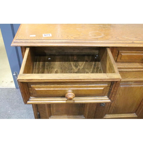 571 - German Oak Dresser Base or Side Cabinet with two drawers over two cupboard doors, raised on bun feet... 